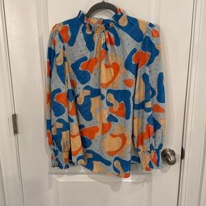 Small, long sleeve blouse